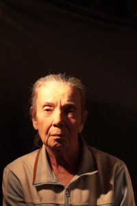 This image is an example of side lighting using a reflector. The reflector softly illuminates the side of the face.